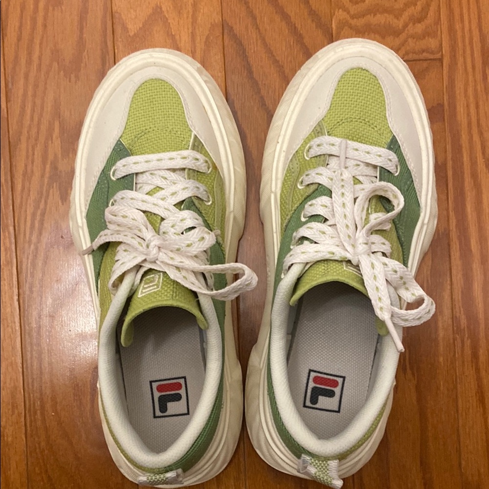 Fila Women’s Sneakers, green and white color good for summer wear.